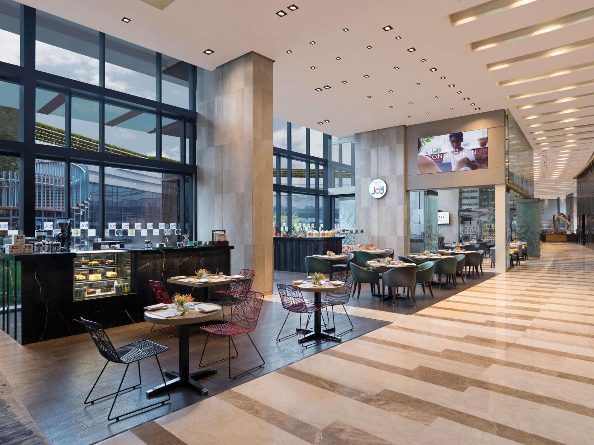 Novotel Kolkata Hotel And Residences Εξωτερικό φωτογραφία The restaurant
